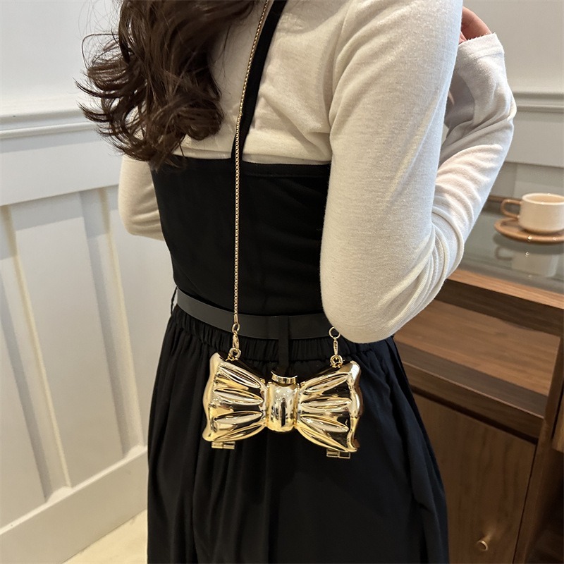 Glanzende gouden metalen strik - Wedding Vendor recensie en prijs